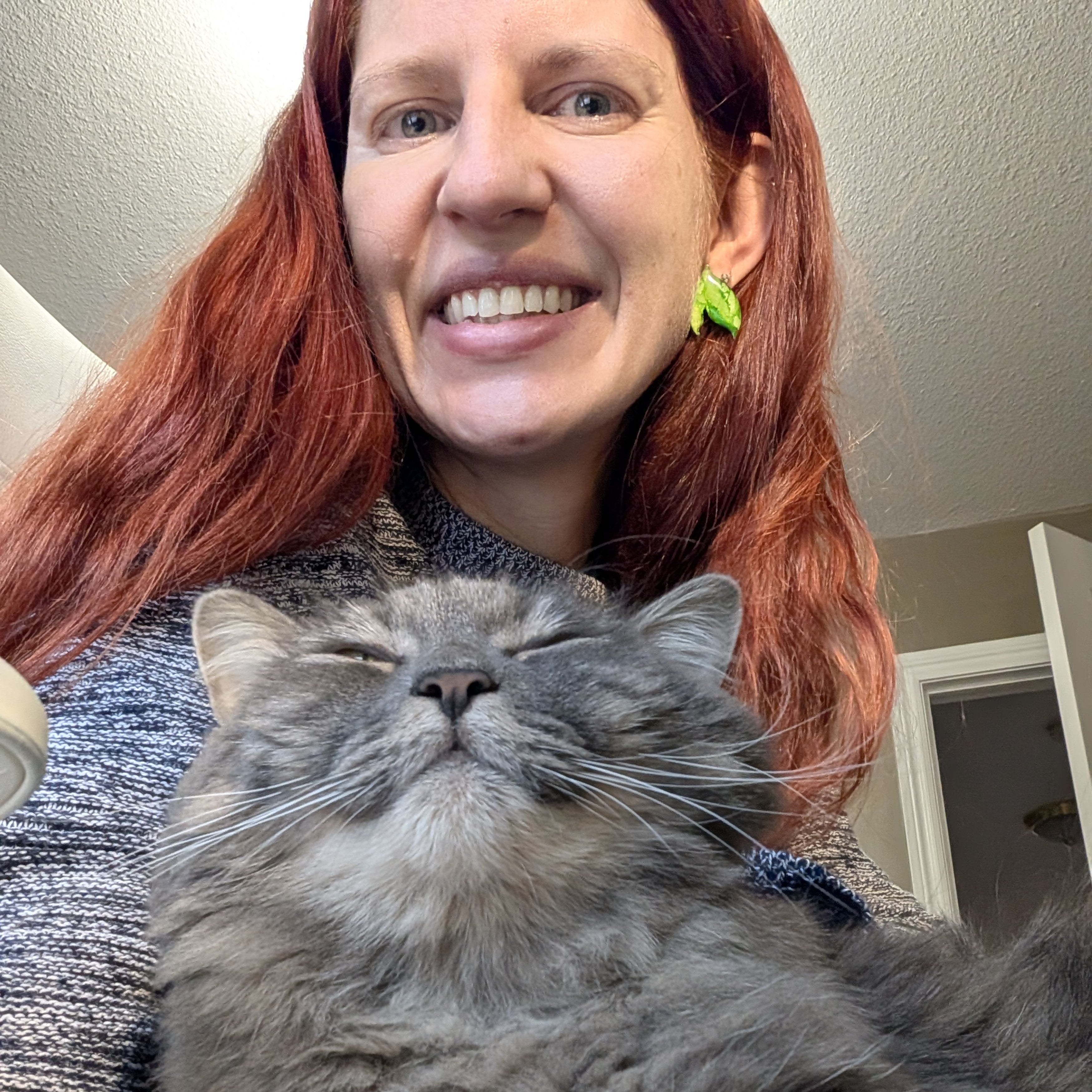 Emerald Glow Blossom Studs