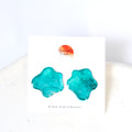 Shimmering aqua painted daisy studs