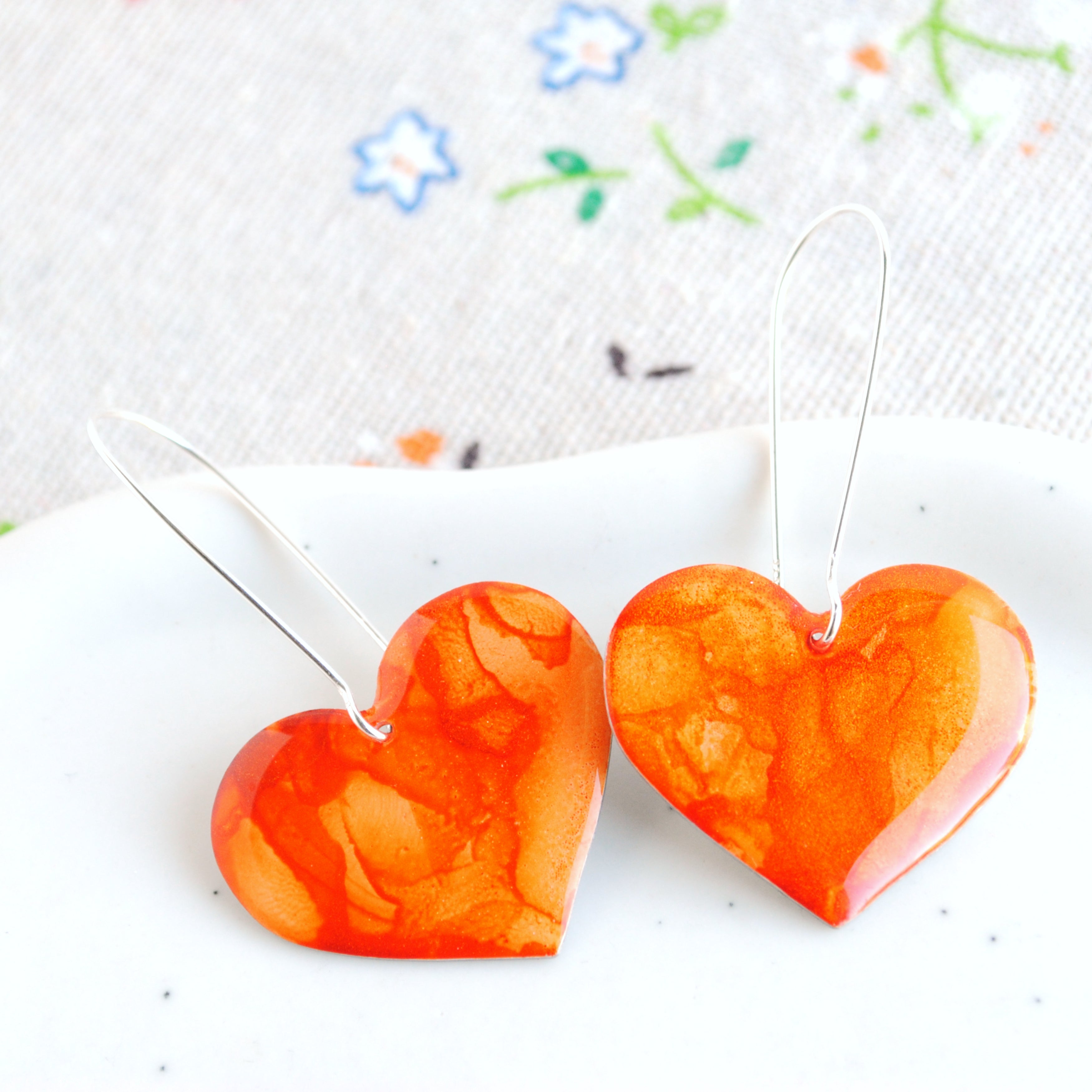 The Life of a Showgirl Orange Rosy Heart Earrings